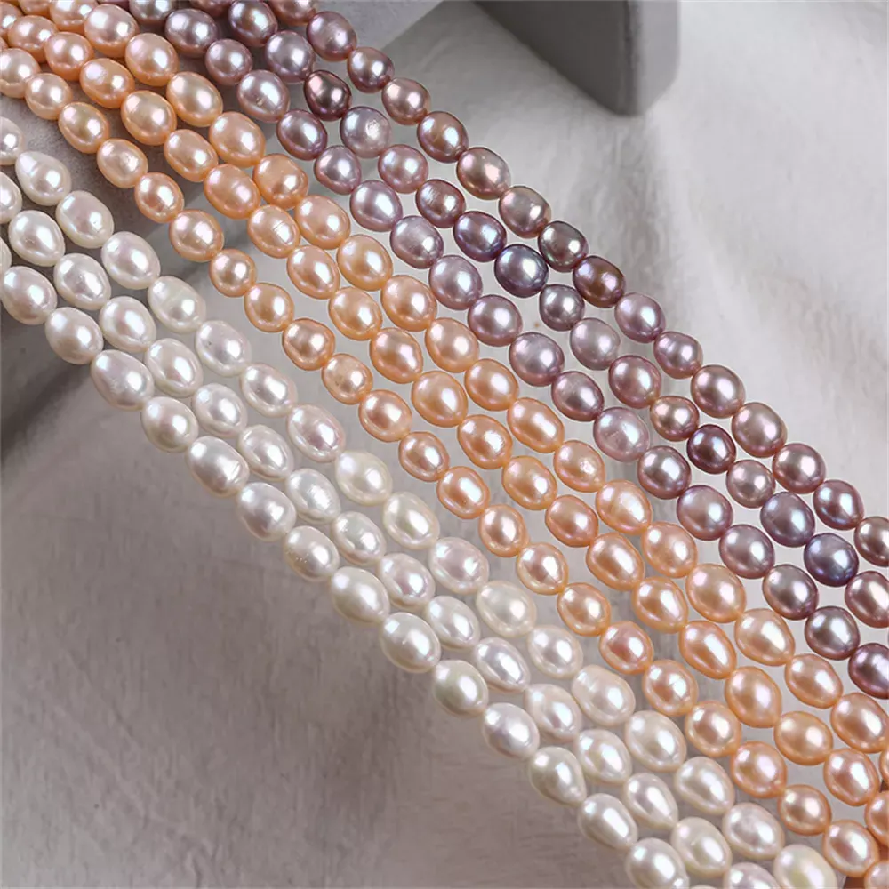 Natural AAAA 7-8mm White pink purple Rice Freshwater Pearl Strands For Sale