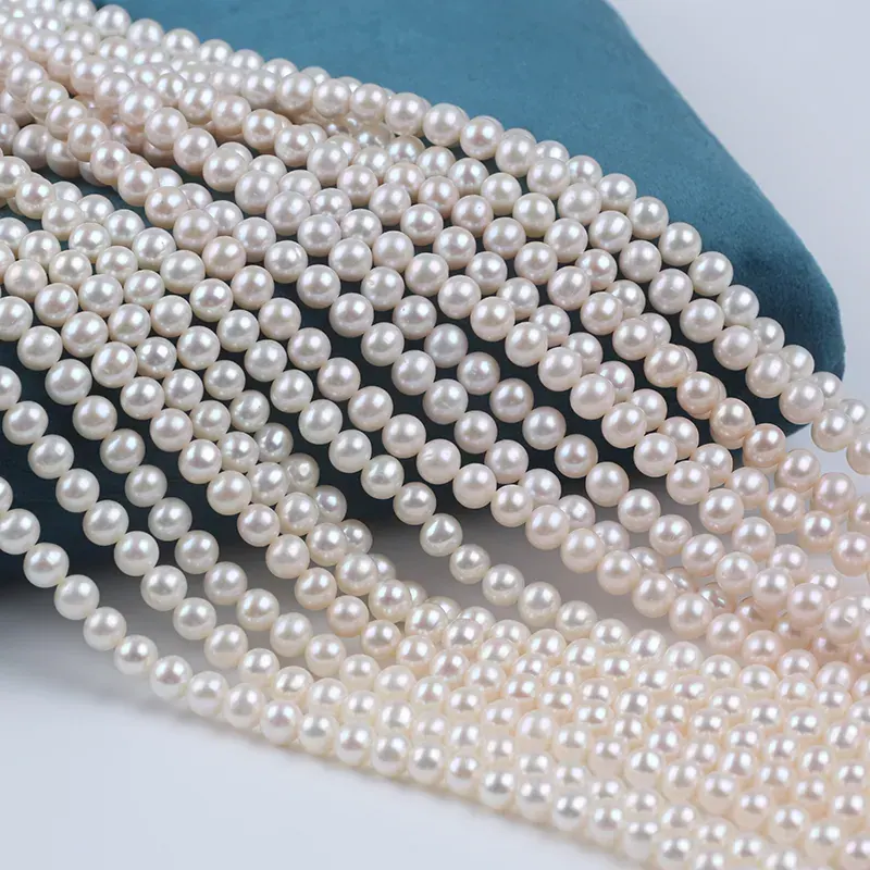 AAAA grade 6-6.5mm White Near Round Freshwater Pearl Strands