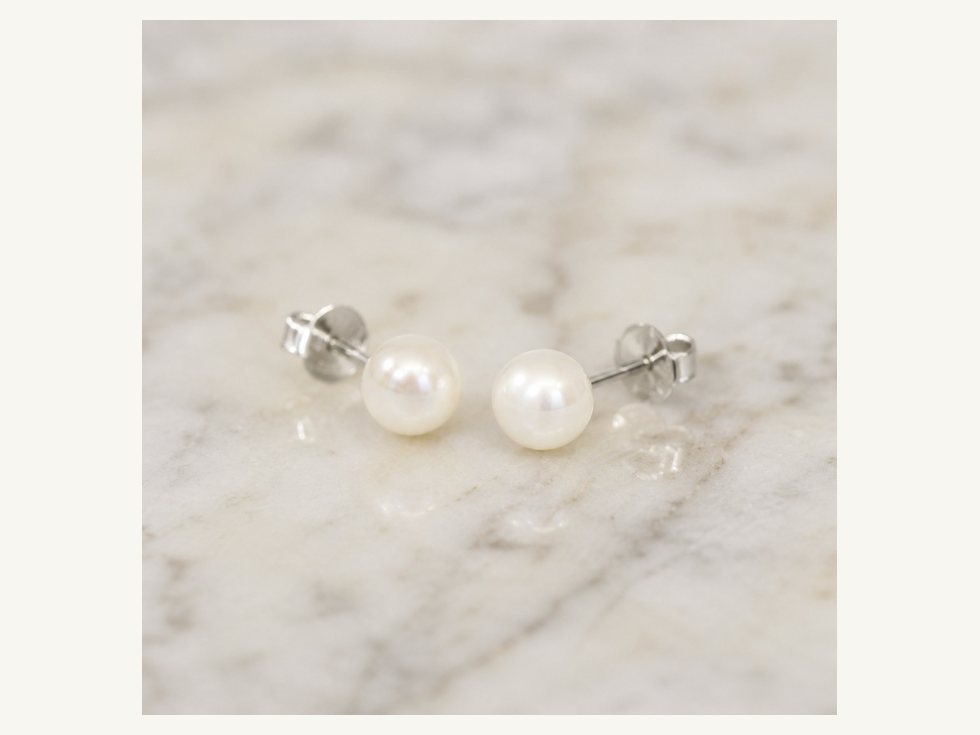Assorted small pearl stud earring sizes