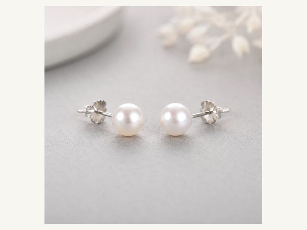 Assorted small pearl stud earring sizes