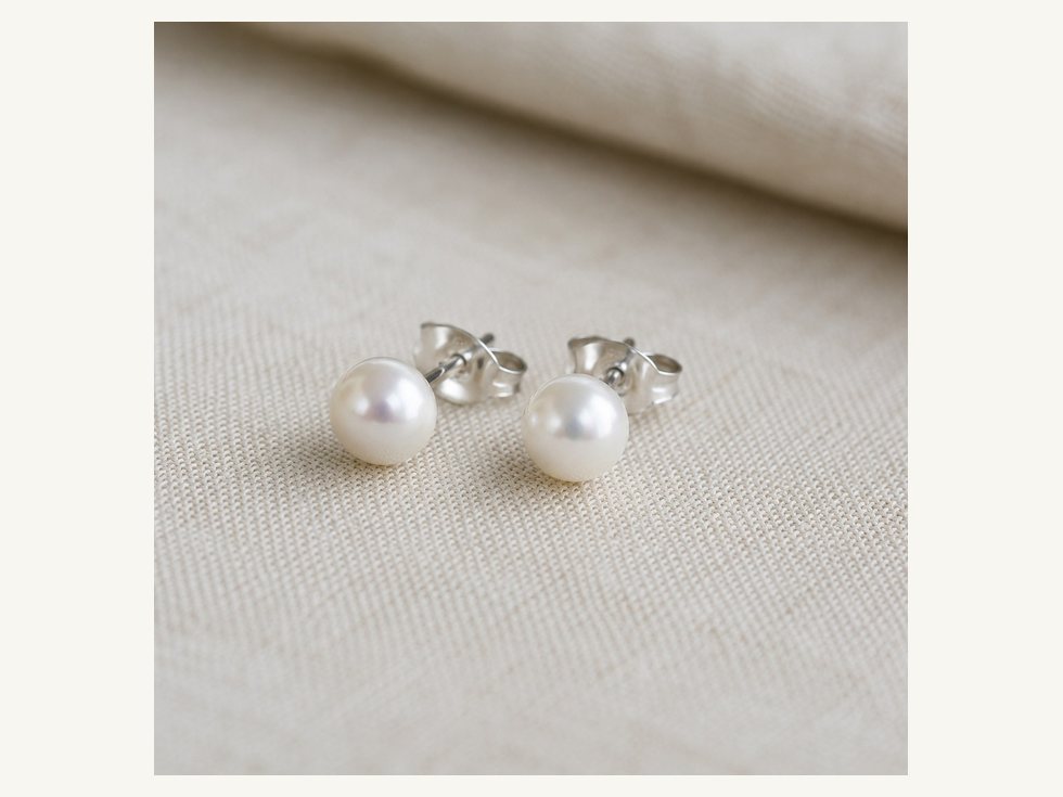Assorted small pearl stud earring sizes
