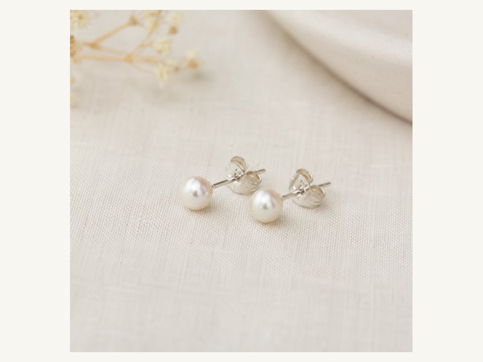 Assorted small pearl stud earring sizes