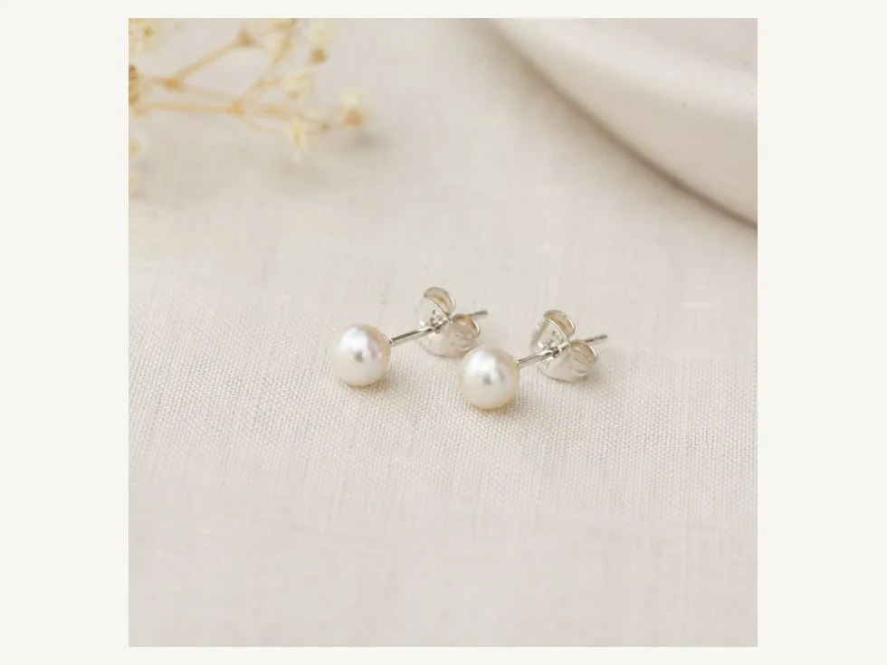 Assorted small pearl stud earring sizes