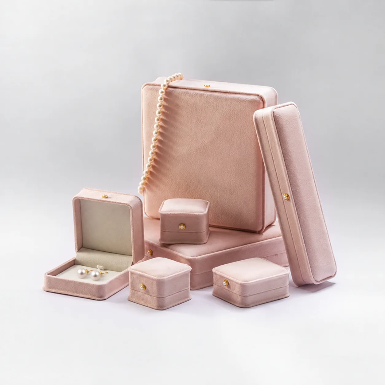 Pink pearl jewelry packaging box set with white freshwater pearl strand and pearl stud earrings